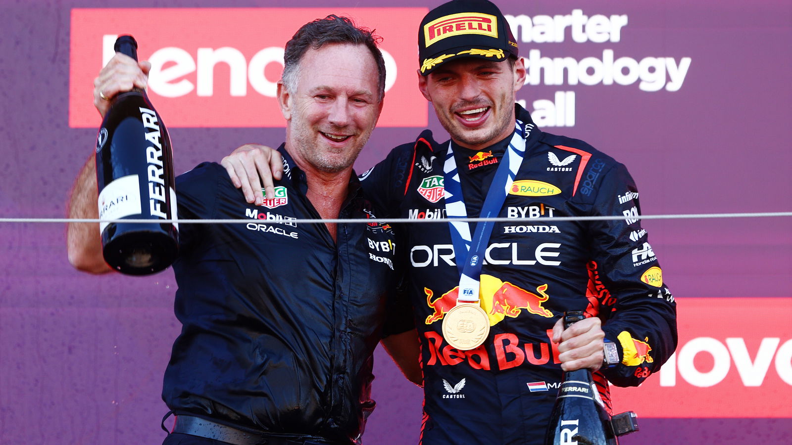 Christian Horner and Max Verstappen of Red Bull Racing celebrate victory in the 2023 Japanese Grand Prix