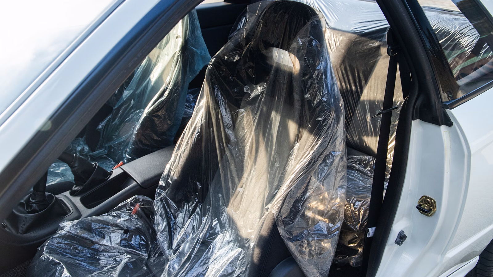 It even comes with the original plastic seat covers
