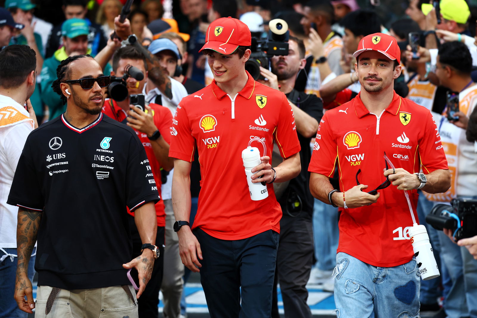 Ollie Bearman with Lewis Hamilton and Charles Leclerc