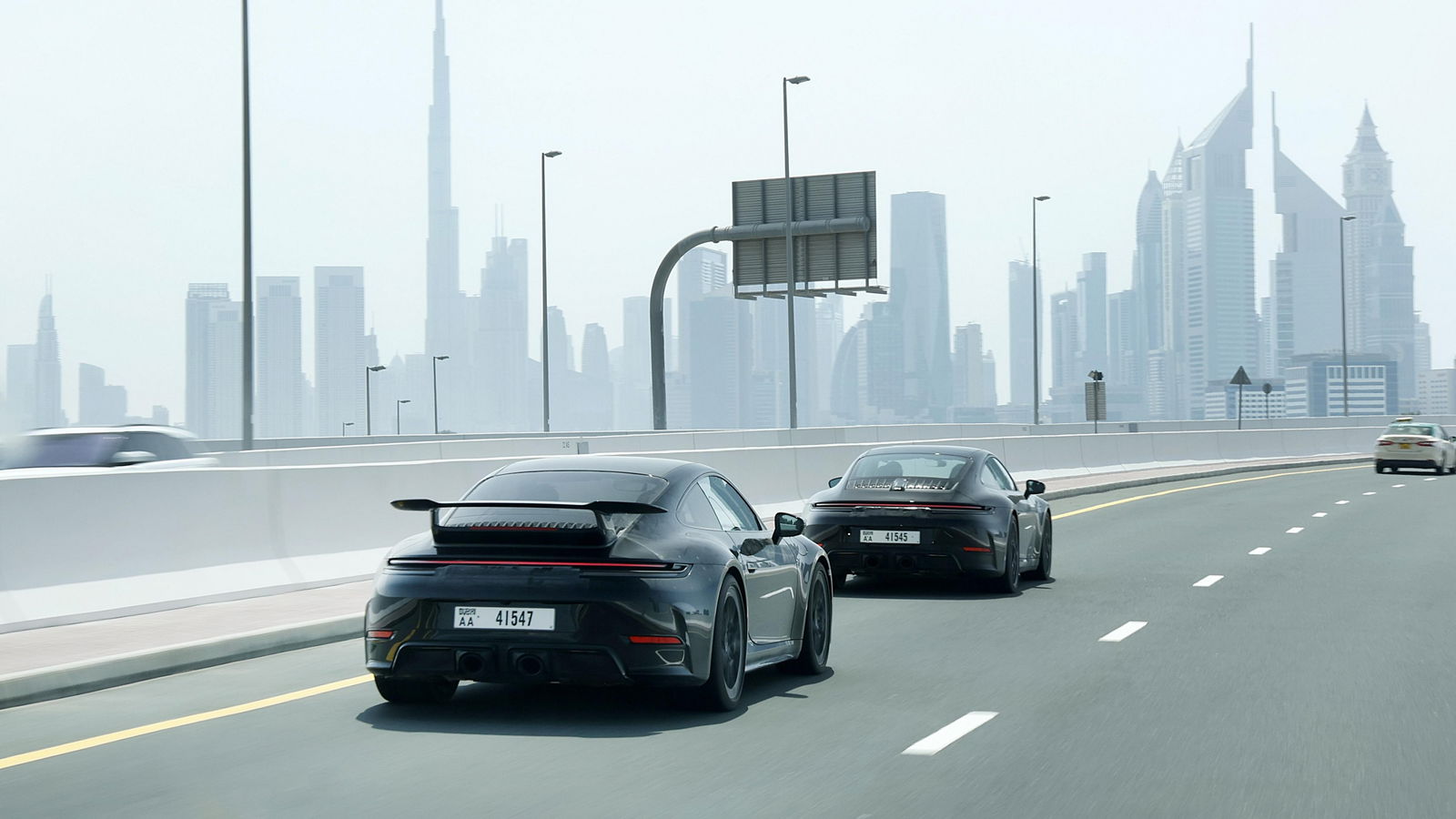 Porsche 911 hybrid prototype - rear, with and without Aerokit