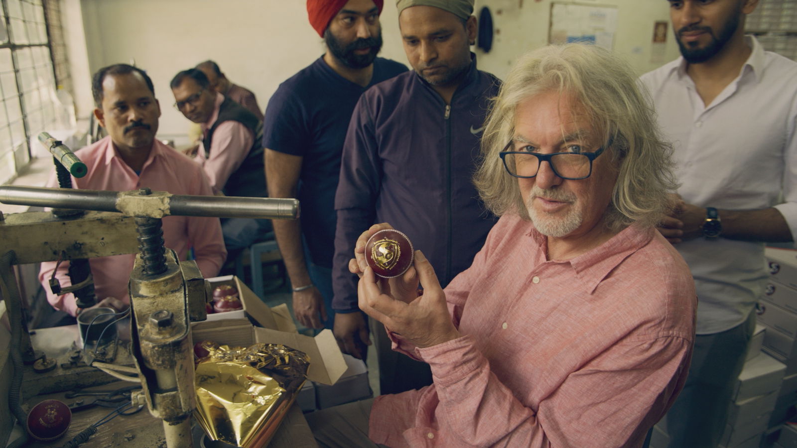 James May holding a cricket ball