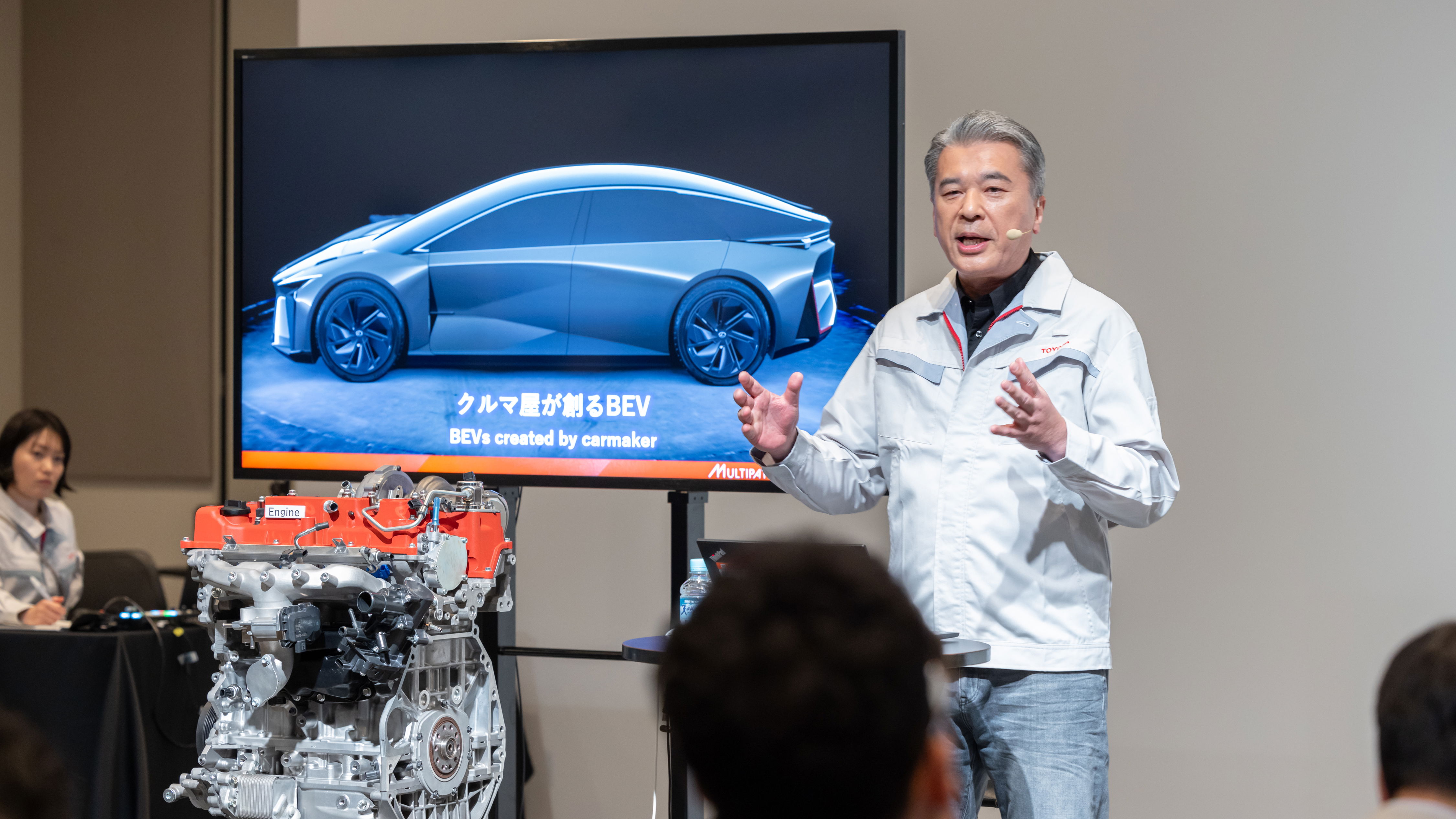 Toyota CTO Hiroki Nakajima with a concept version of the company's new 2.0-litre engine