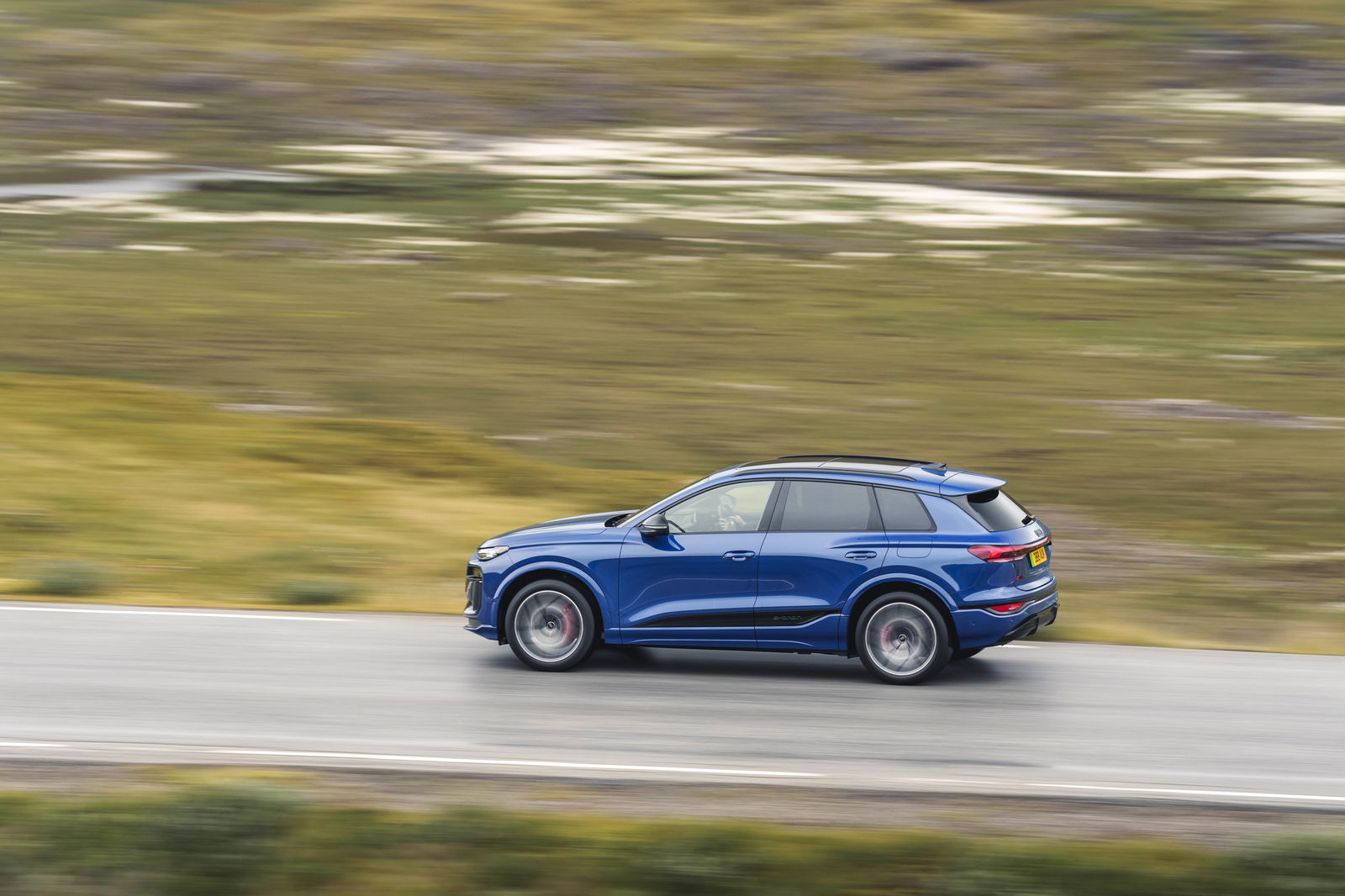 Audi Q6 E-Tron - side, driving
