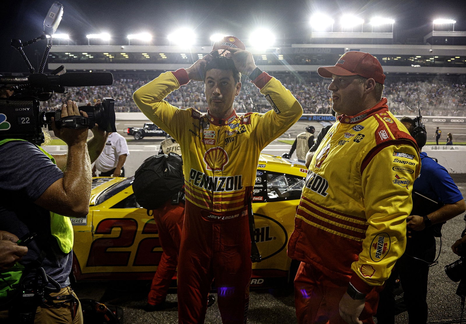 Joey Logano in pit lane after the crash (© Sean Gardner/Getty Images)