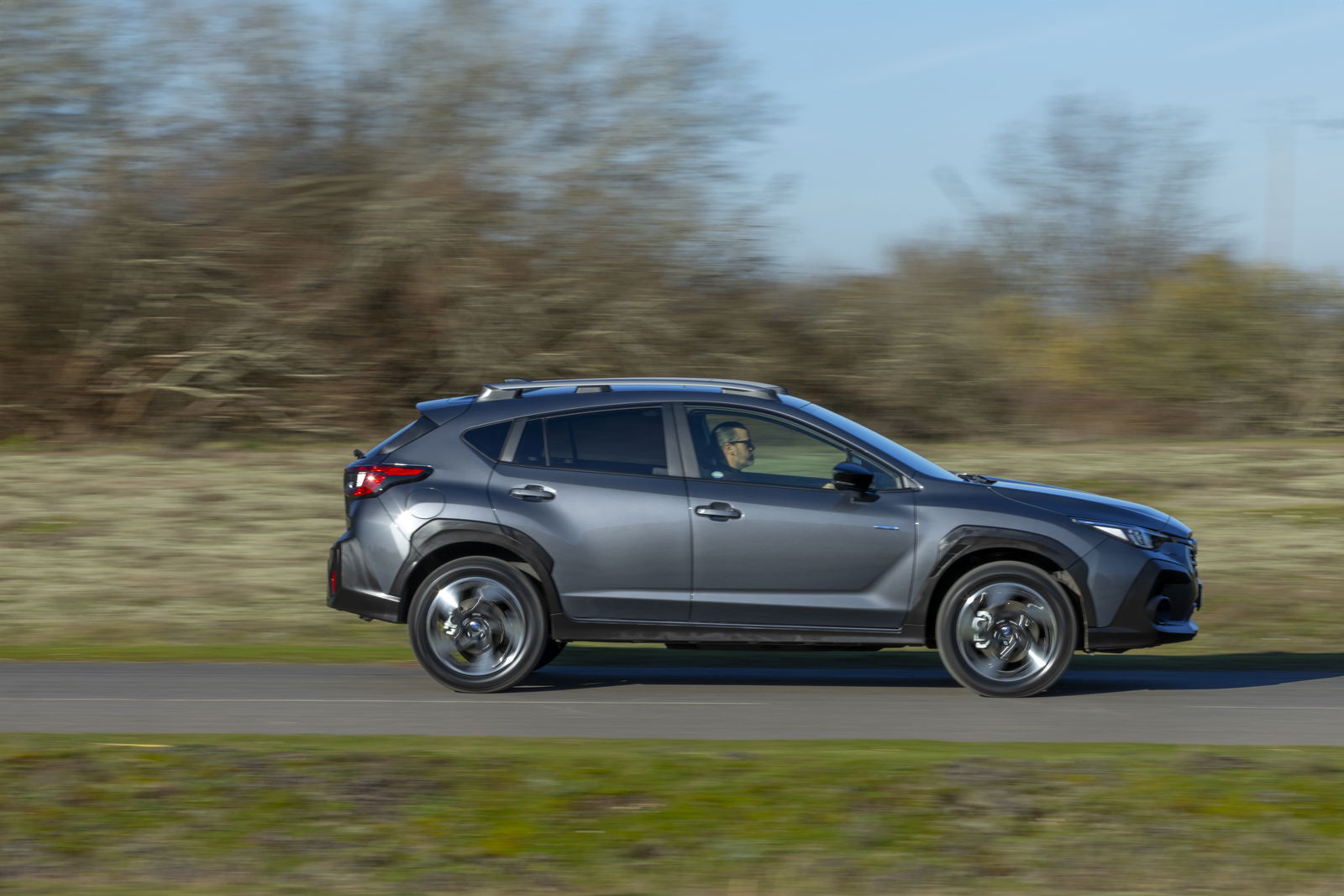Subaru Crosstrek - side, driving