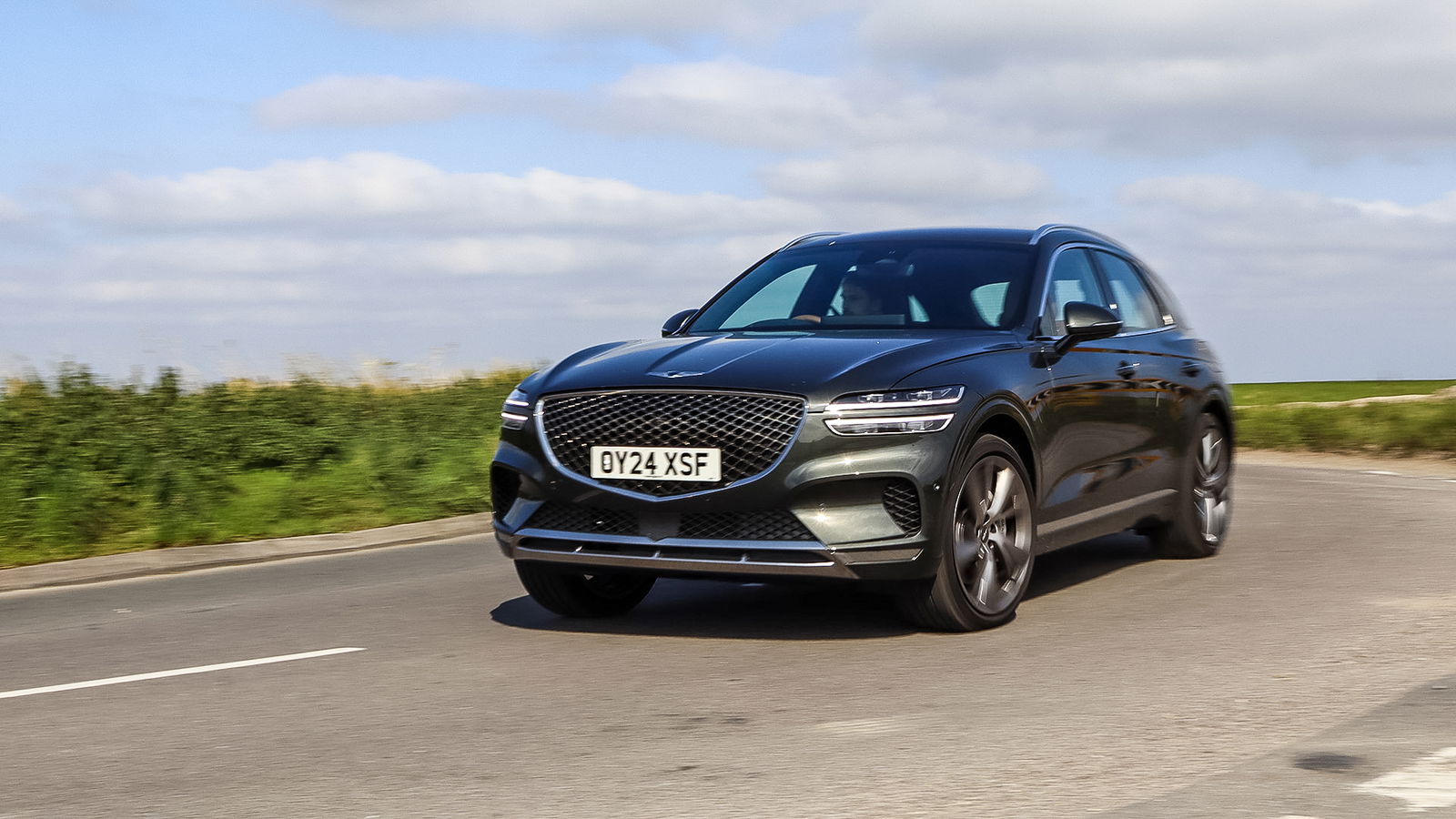 Genesis GV70, Storr Green, front 3/4 driving
