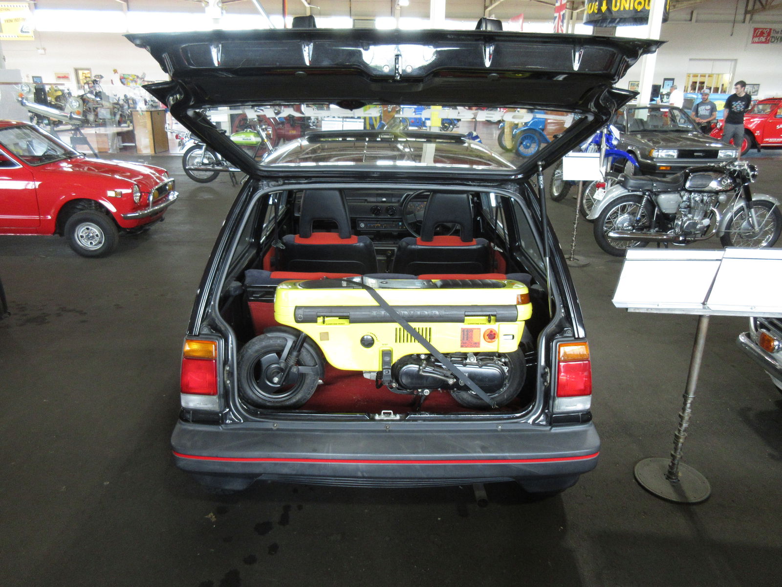 Honda Motocompo in the boot of a Honda City