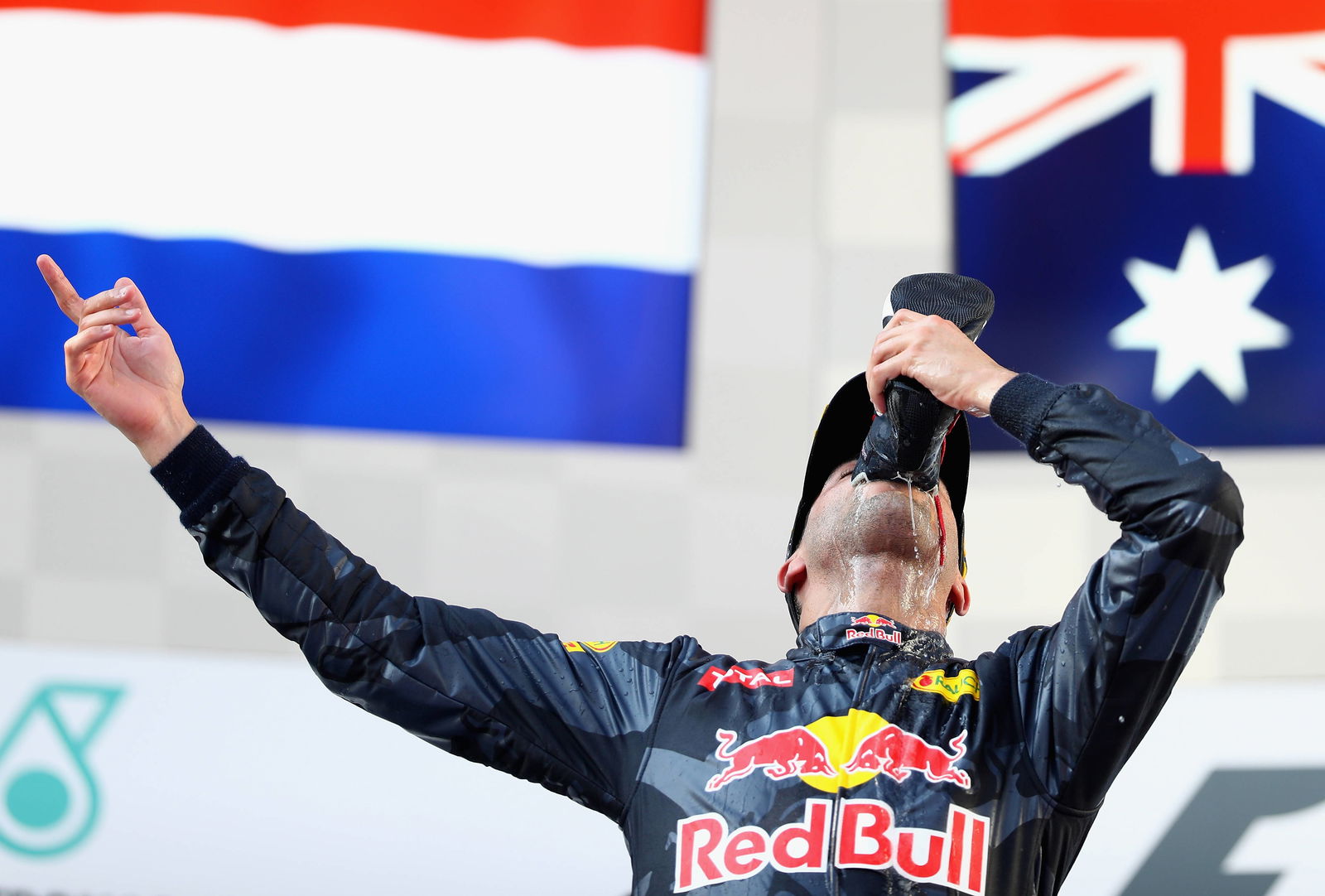 Daniel Ricciardo celebrating with a 'shoey'