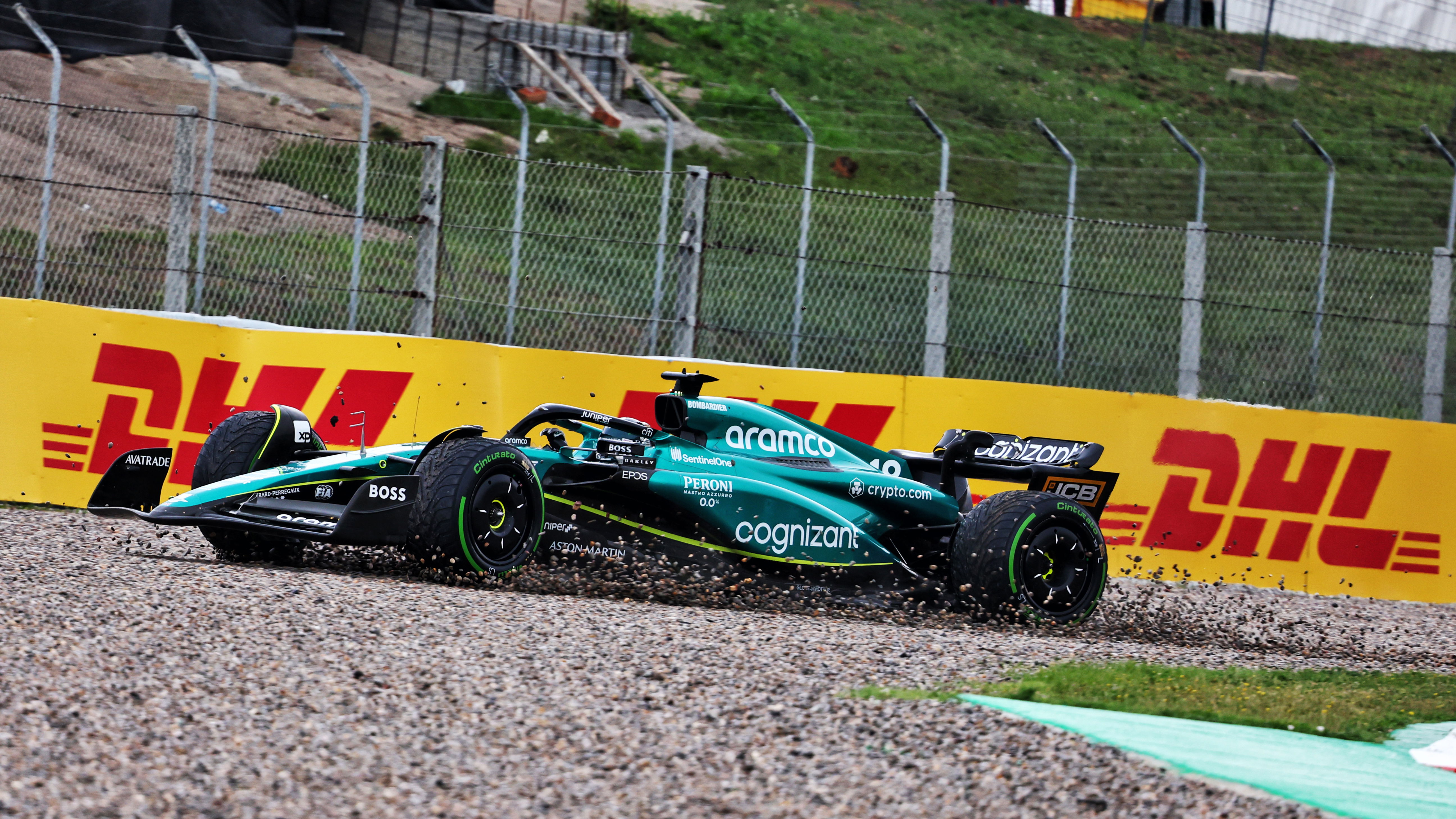 An Aston Martin F1 car sliding into the gravel during the 2023 Spanish Grand Prix (XPB Images)