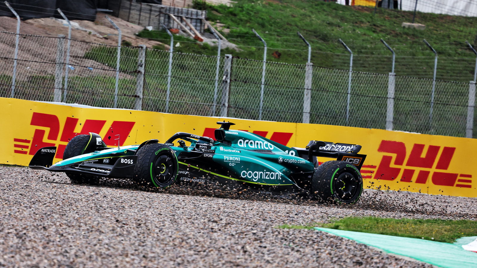 An Aston Martin F1 car sliding into the gravel during the 2023 Spanish Grand Prix (XPB Images)