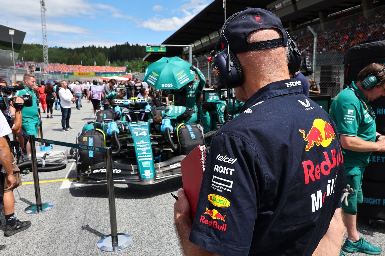 Adrian Newey looking at an Aston Martin F1 car