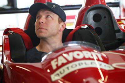 Chris Hoy at the wheel of a Courage racing car