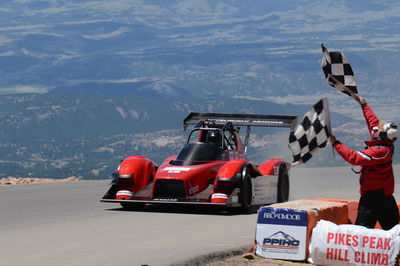 An electric Mitsubishi i-MiEV Evo III competes at Pikes Peak in 2014