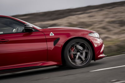 Alfa Romeo Giulia Quadrifoglio - side detail, driving