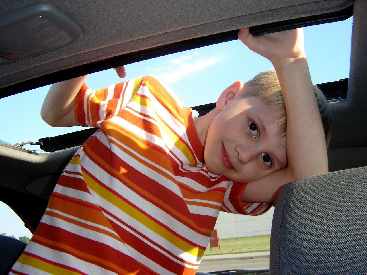 10 Sounds A Parent Never Wants To Hear Coming From The Back Seat