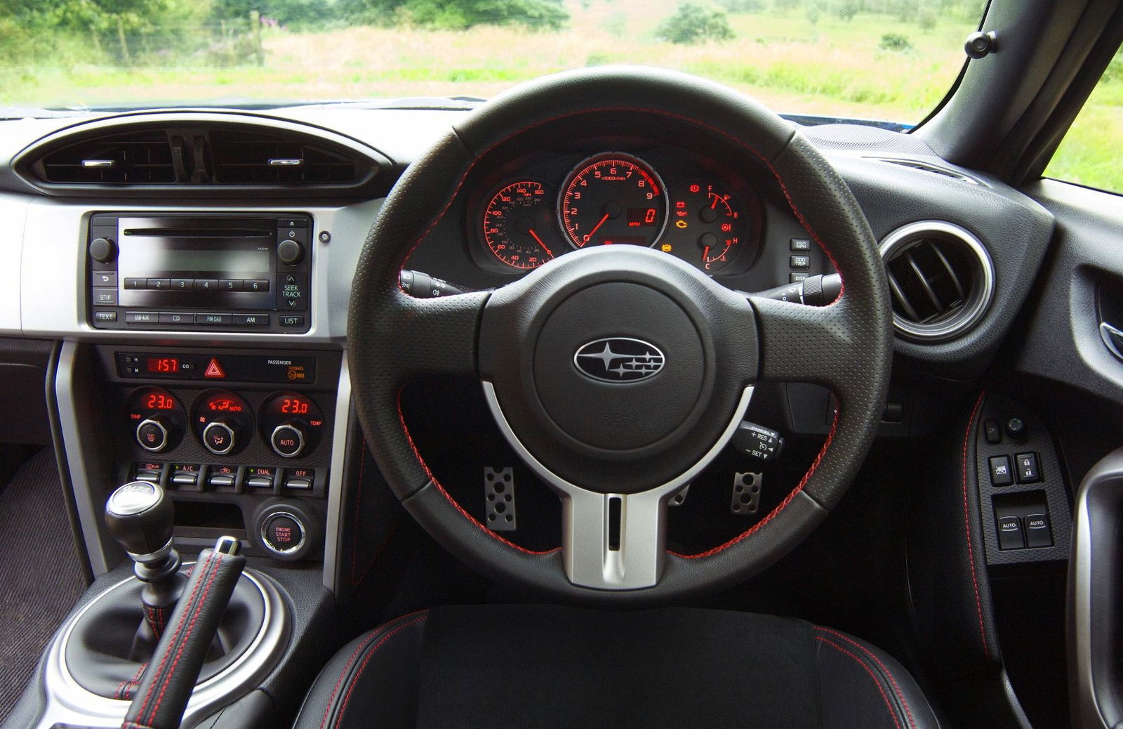 It's not the most exciting cockpit, and the Pioneer sat nav is infuriating, but get on a good bit of road and you won't want to be anywhere else