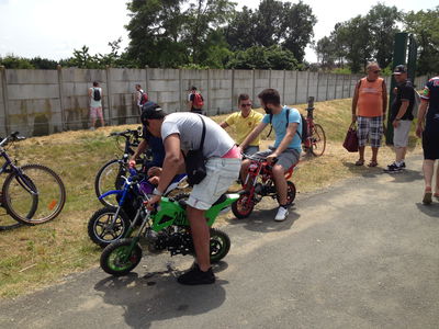 More lads on micro bikes. The best way to travel around through the crowds, surely