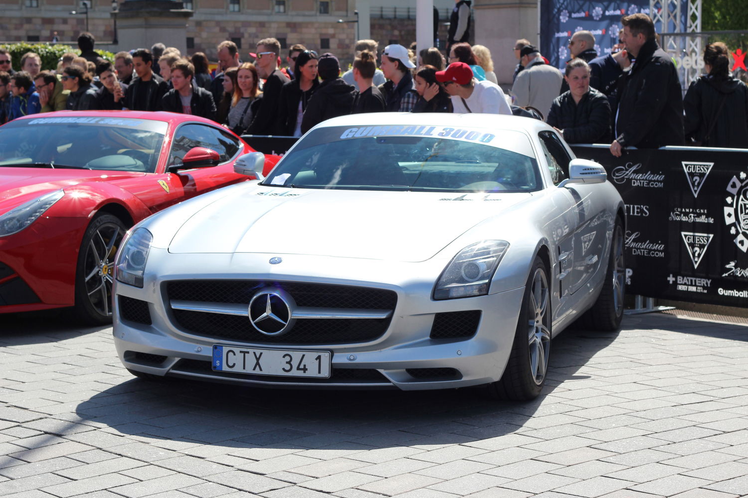 6.3-litre SLS AMG will be showing off its Gullwing party trick no doubt