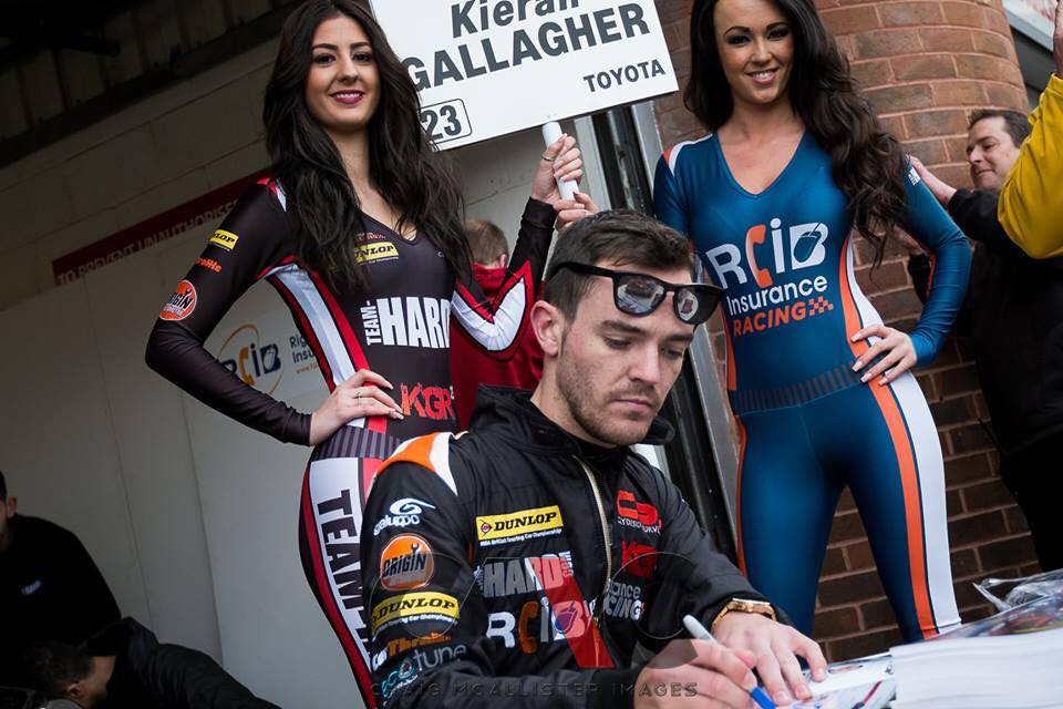 Gallagher signs autographs at the season opener at Brands Hatch.