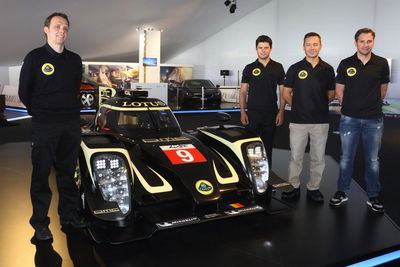 The Lotus LMP P1/01 Race Car Is A Black And Gold Beauty