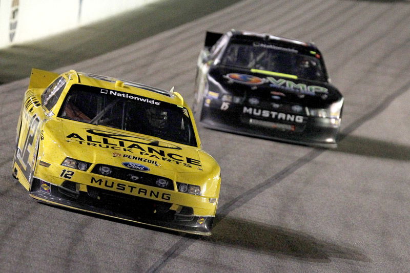 A pair of Mustangs dueling in the Nationwide Series