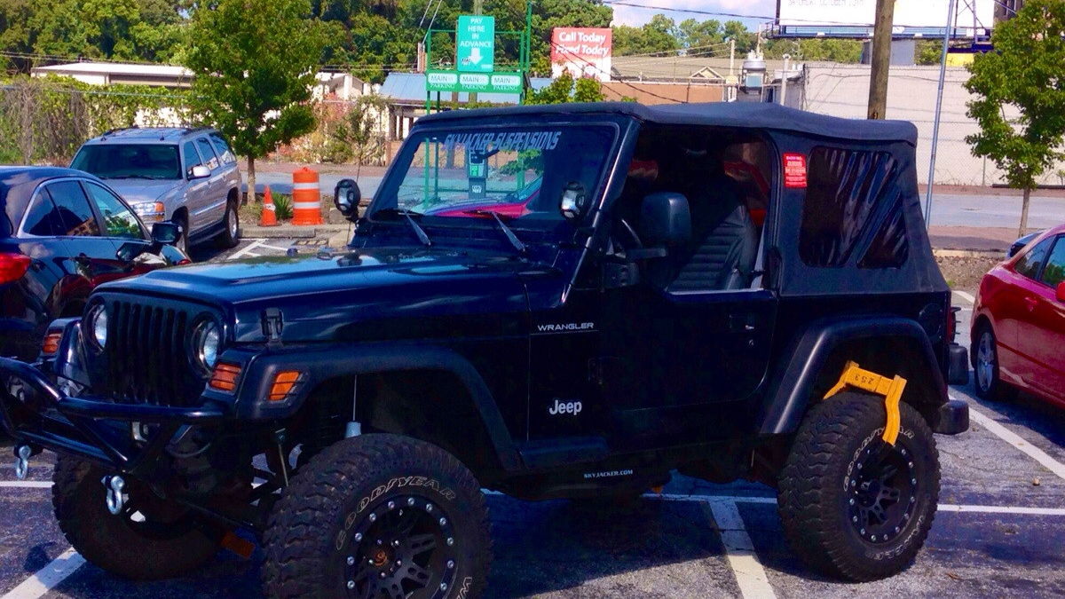 Park Like This In Atlanta And You'll Get A Clamp For Every Space You Take Up 