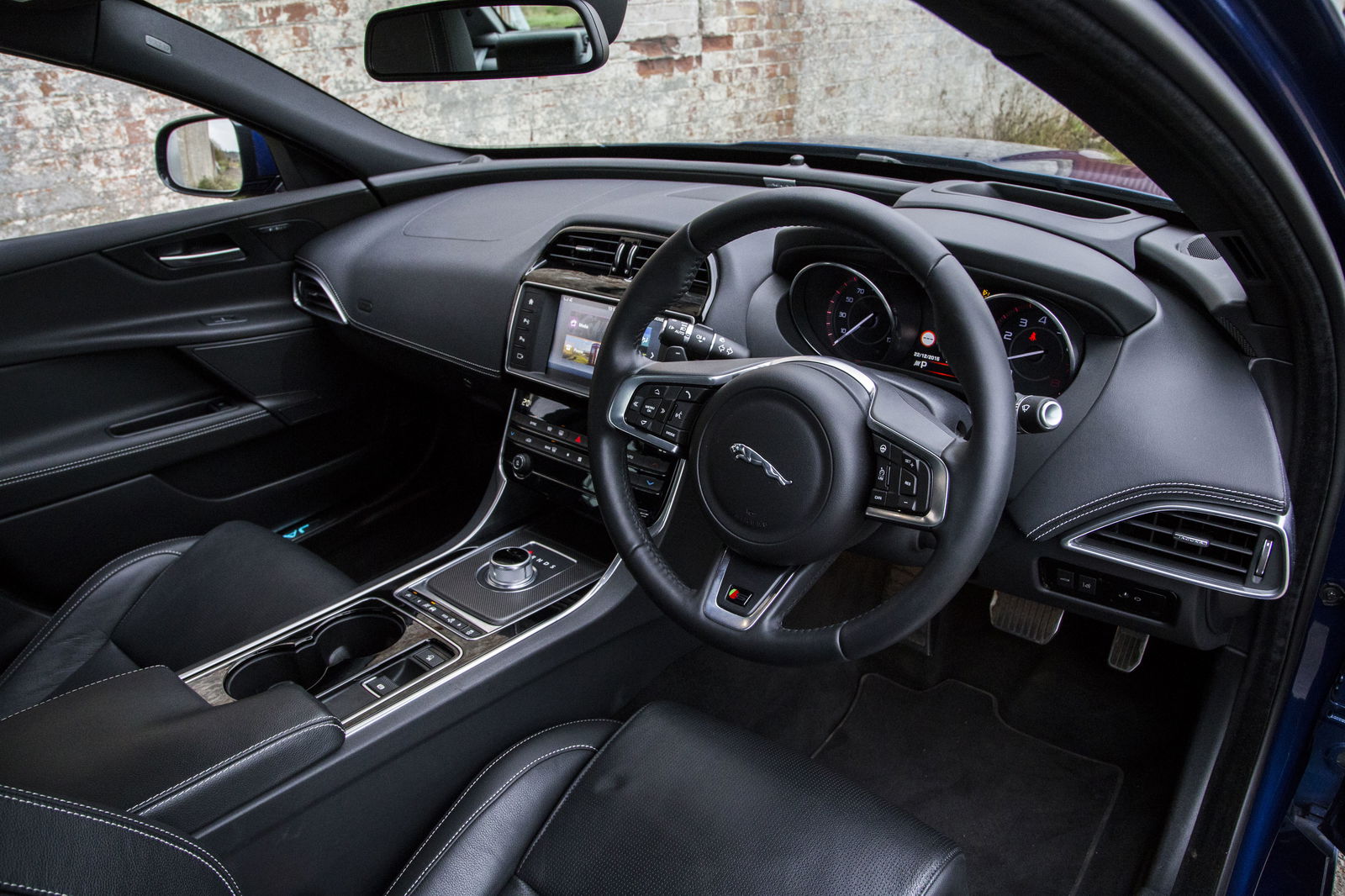 What It's Like Jumping From An Ultralight Track Day Weapon To A Luxury Performance Saloon