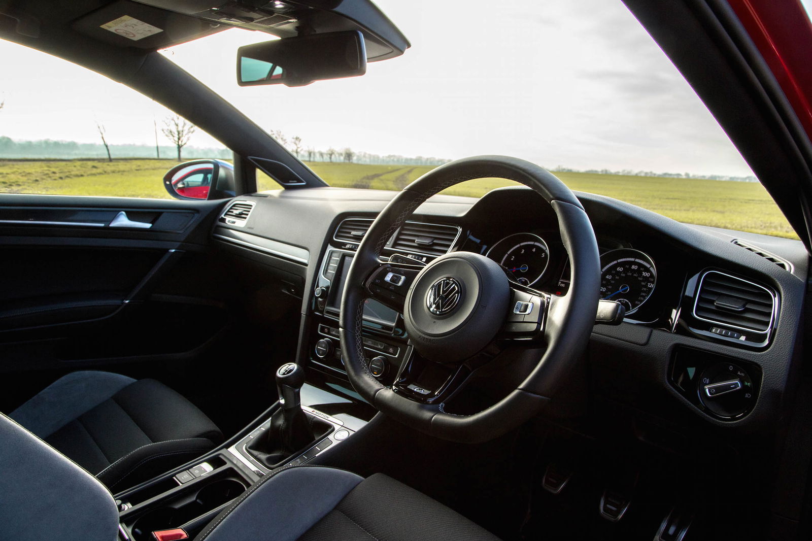Other than the badging and a leather trimmed steering wheel (as opposed to one clad in Alcantara), there's little to tell the R's dash apart from the GTI's