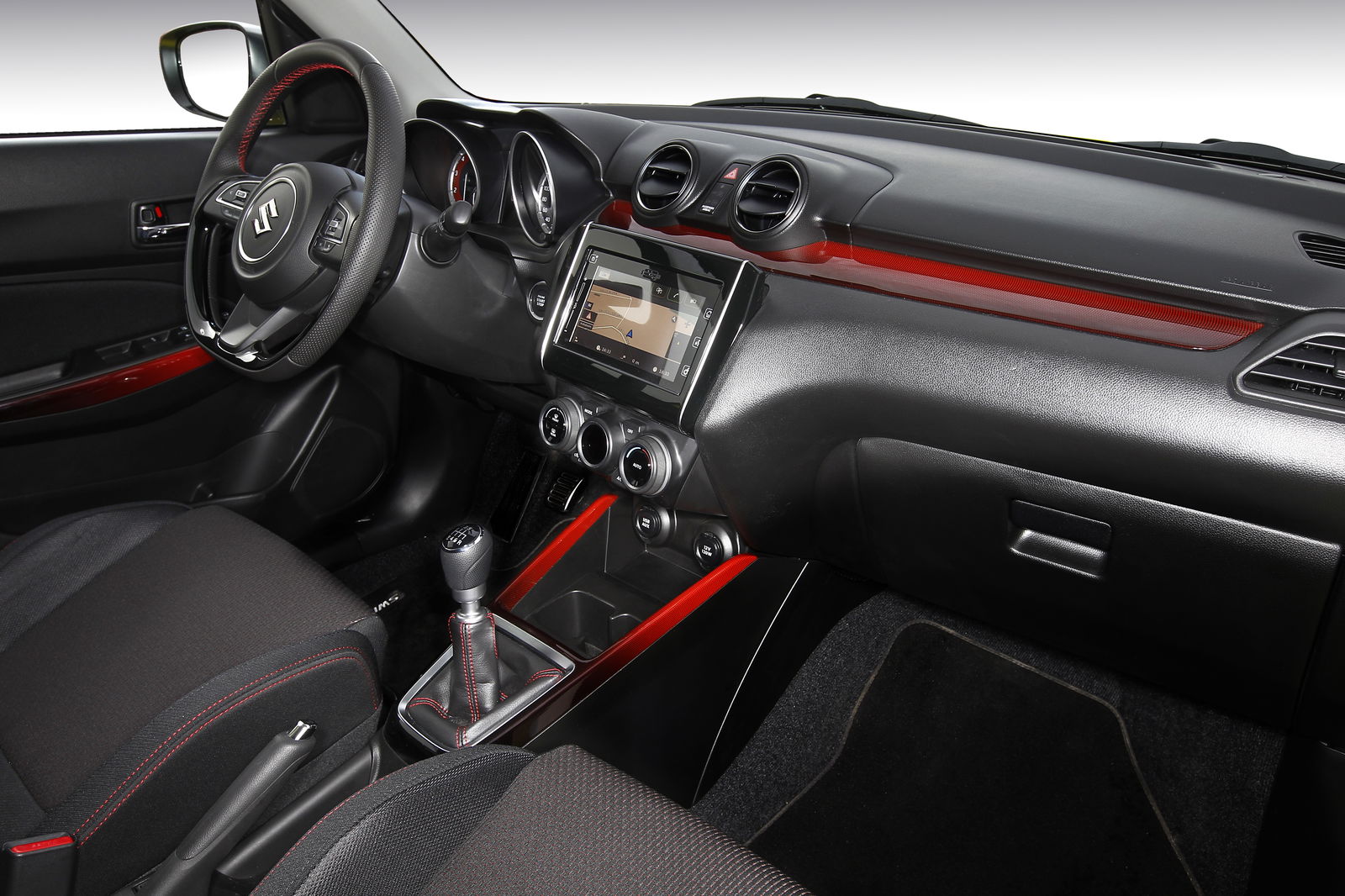 Spec-for-spec a Mini Cooper will be more expensive, but it'll be nicer inside than the Swift Sport