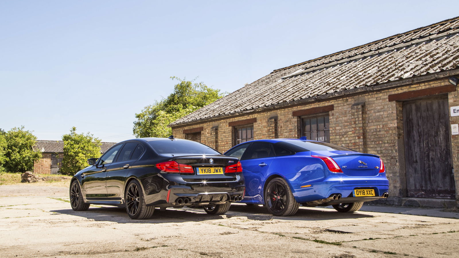 BMW M5 Vs Jaguar XJR 575: The Tech-Fest Saloon Takes On A V8 Dinosaur