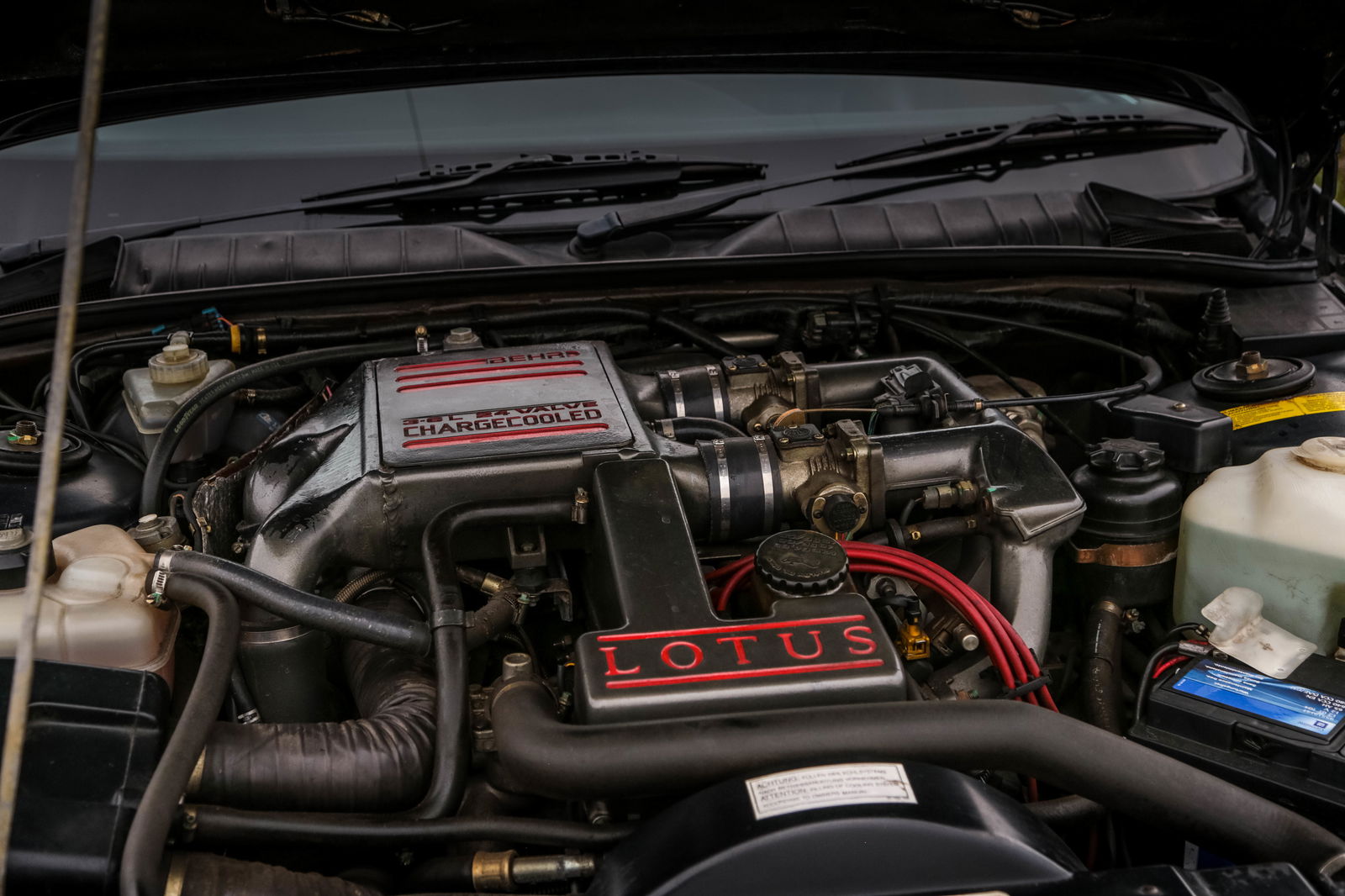 Lotus took the Carlton GSI 3000's straight-six, enlarged it, and added two turbochargers