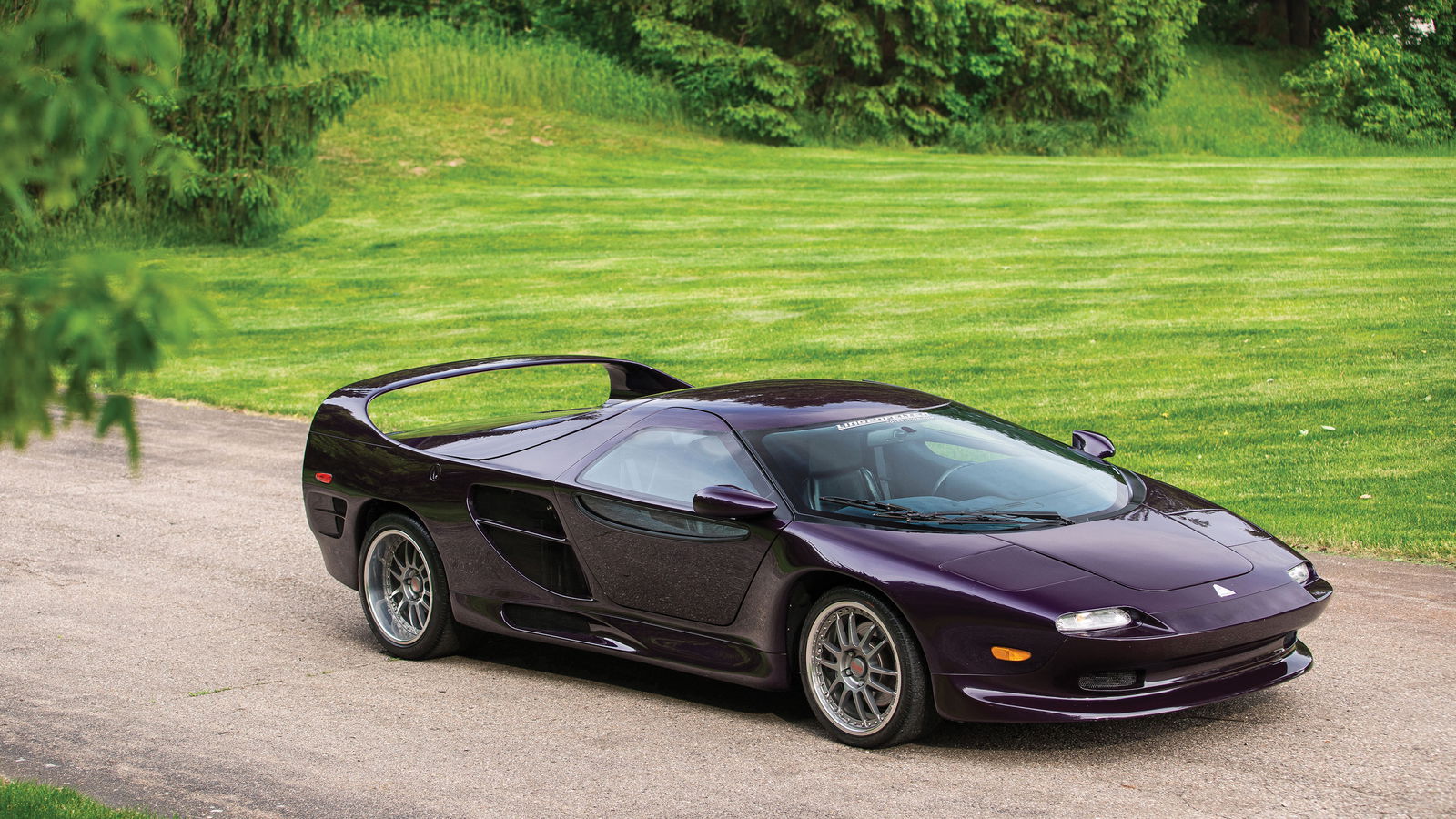 Your Chance To Own A Vector M12: A Supercar With The Strangest Backstory