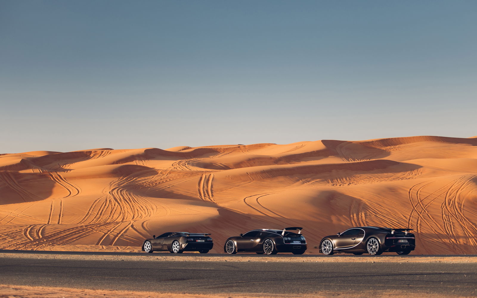 Three Generations Of Quad-Turbo Bugatti Come Together For Incredible Photocall