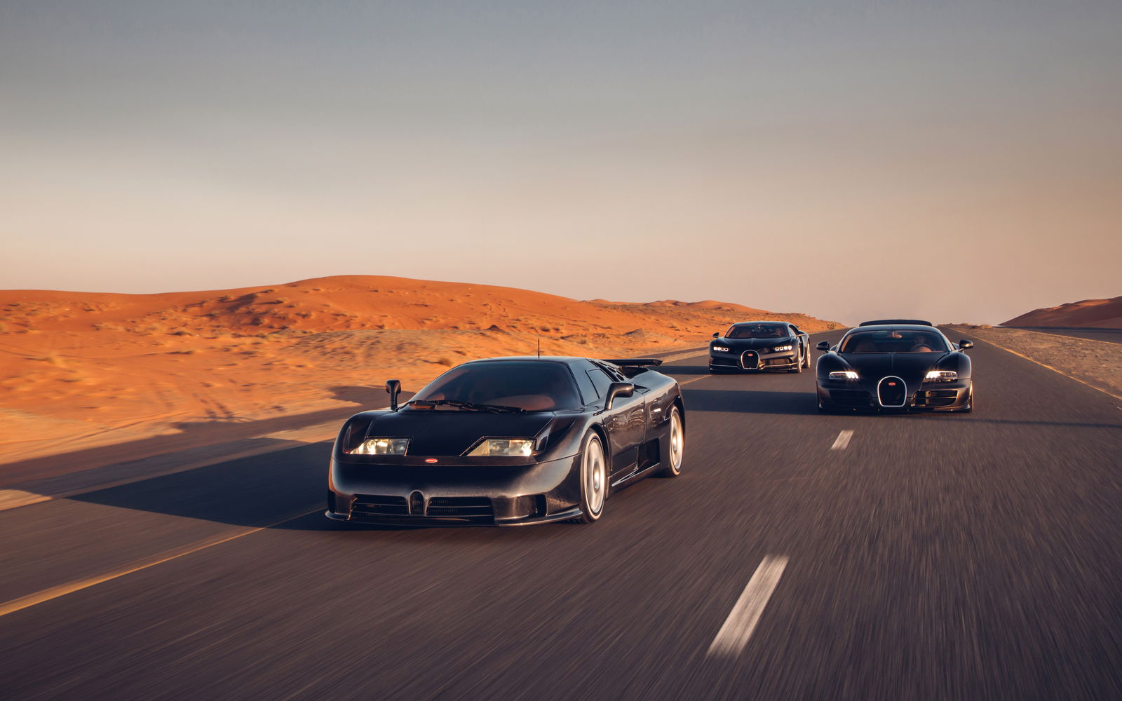 Three Generations Of Quad-Turbo Bugatti Come Together For Incredible Photocall