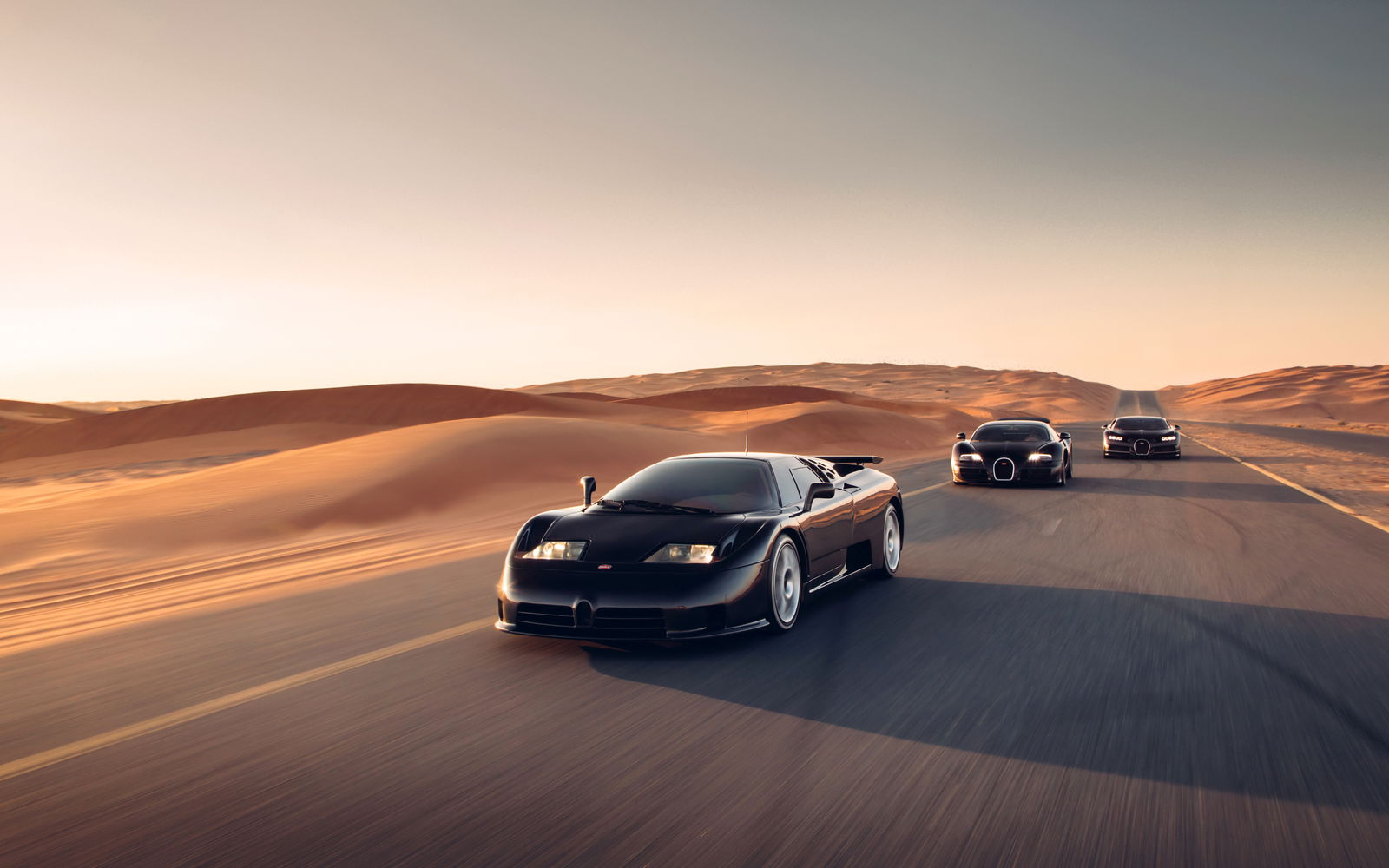Three Generations Of Quad-Turbo Bugatti Come Together For Incredible Photocall