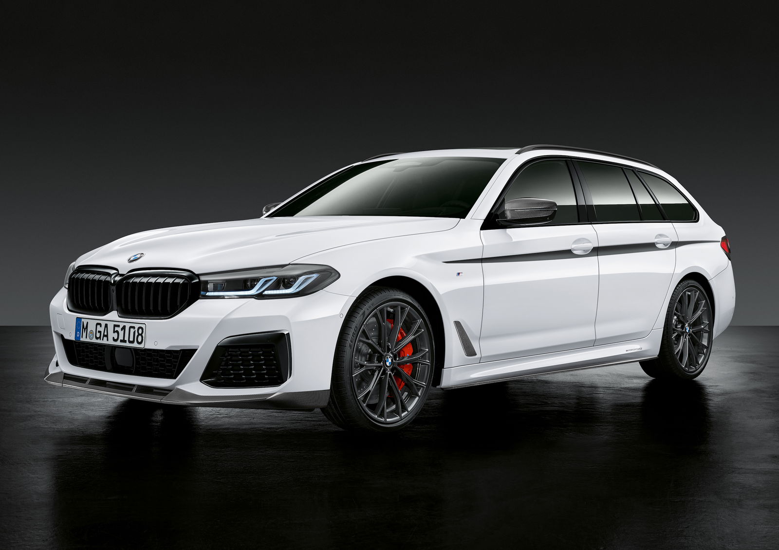 BMW Has Chucked M Performance Parts And Snazzy Stripes At The New M5