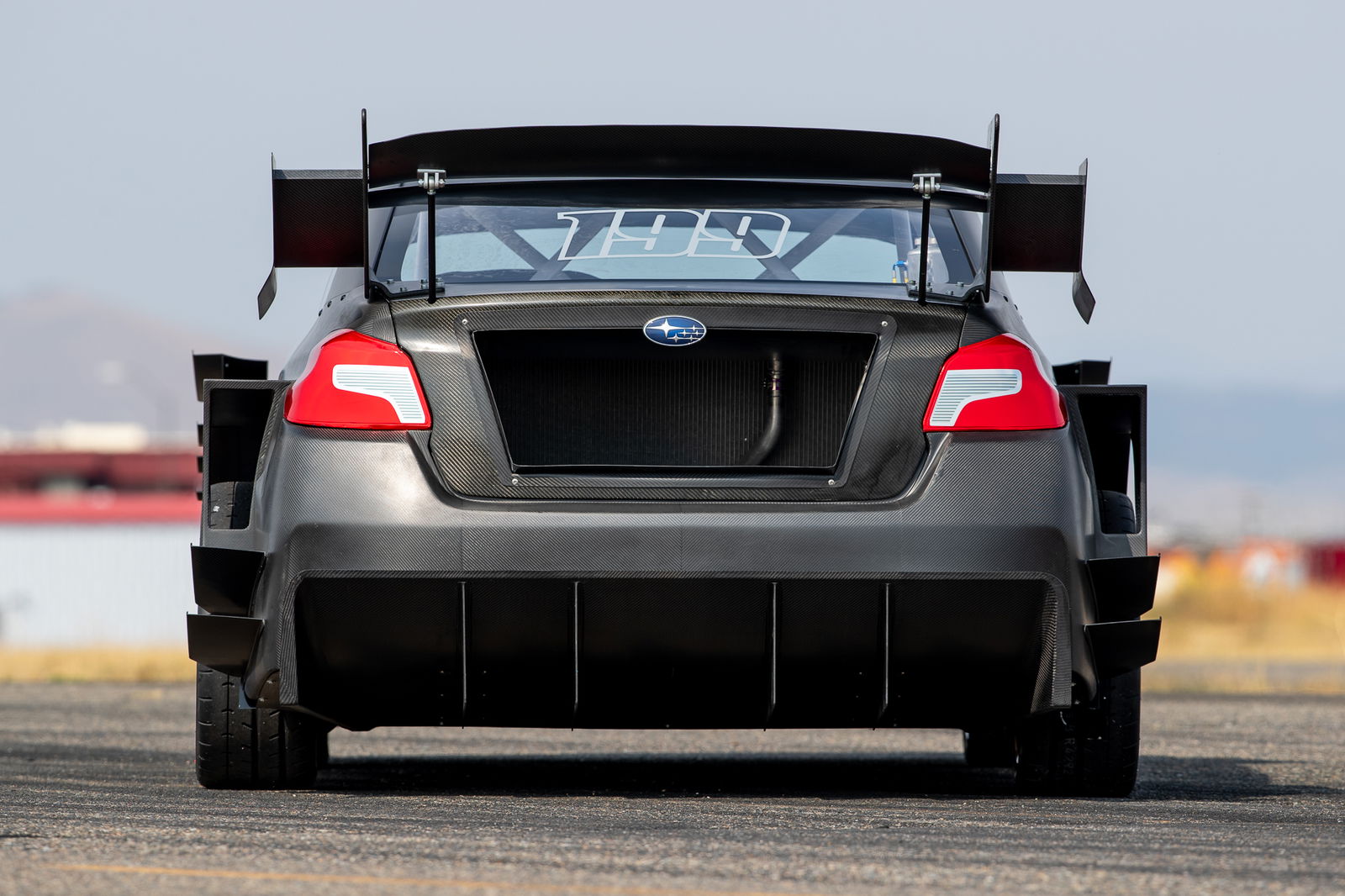 This Naked Carbon Subaru WRX STI Is Travis Pastrana's Gymkhana Beast