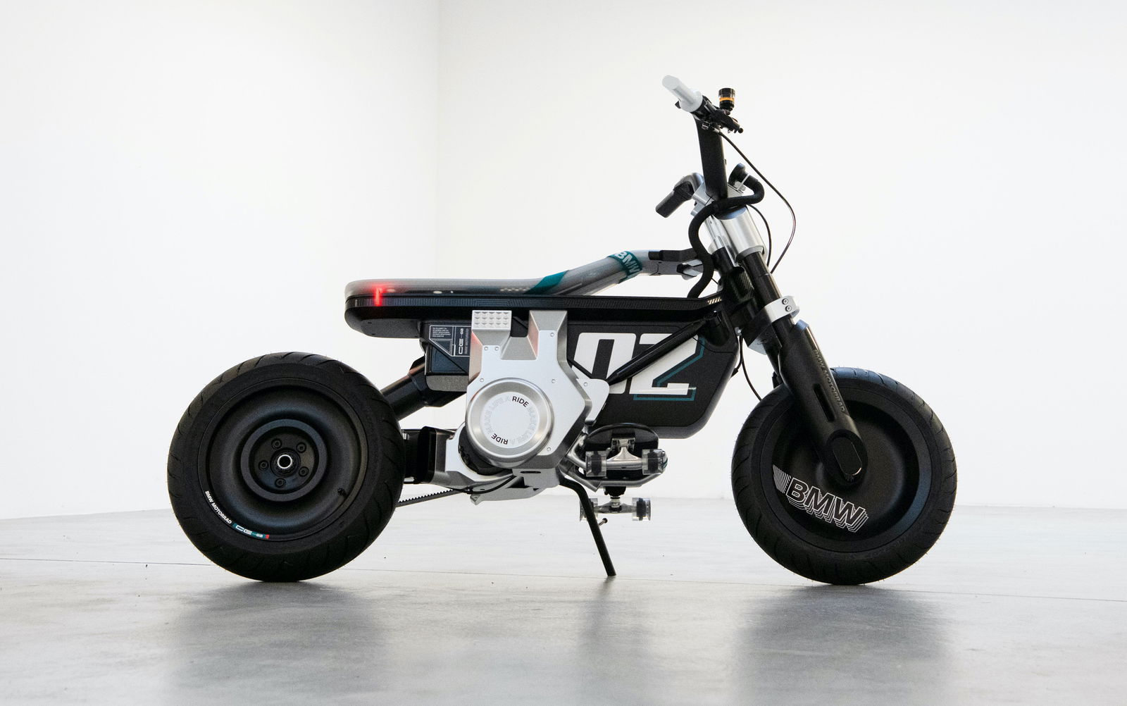 The BMW Concept CE 02 Is A Motorbike For The Future With A Skateboard Foot Rest