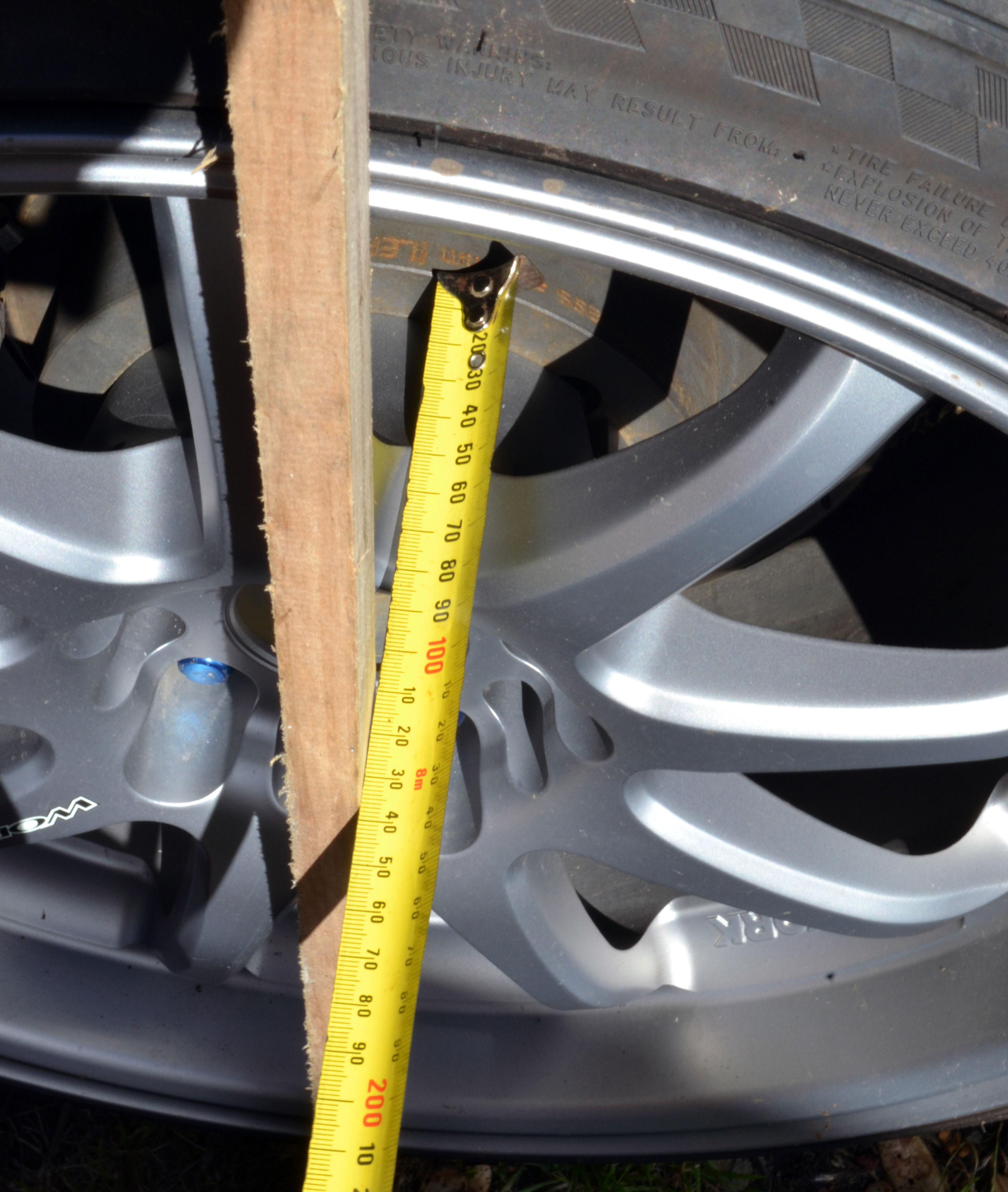 Measuring from the wheel arch to the wheel hub