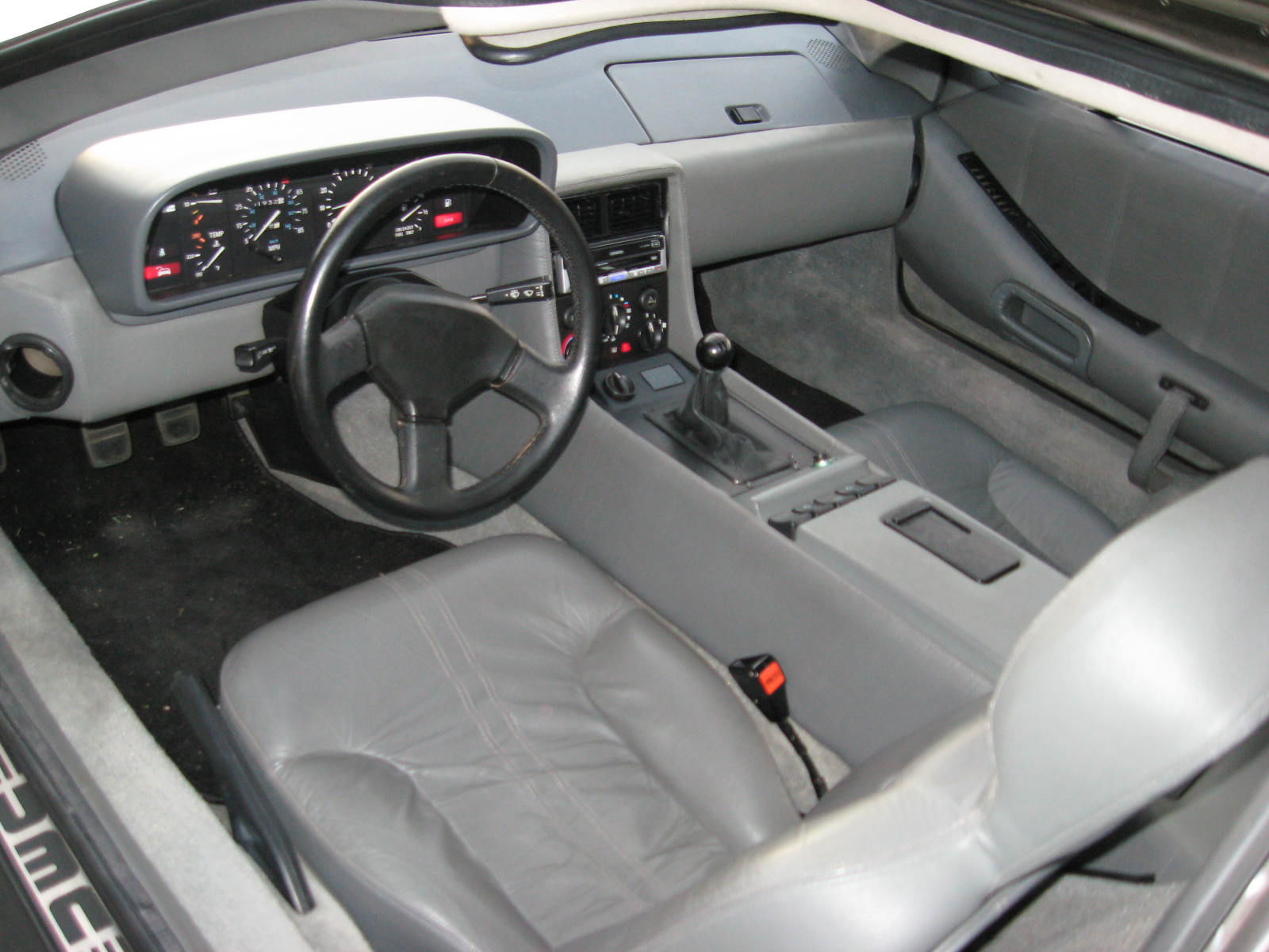 The DMC-12's leather interior, which showcased its iffy build quality. The only factory option was an automatic transmission.