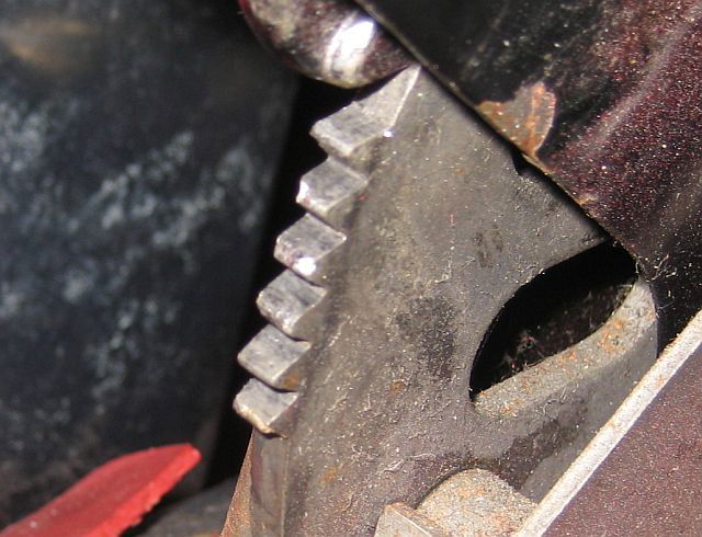 Ratchet bracket in a handbrake lever.