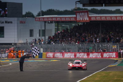 The No.22 Nissan crossing the finish line