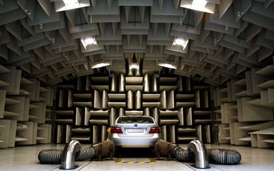 An NVH chamber is used to measure the output frequencies from a car for tuning