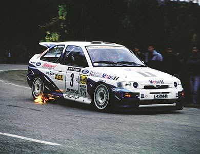 An Escort WRC, belching flames out the side, as per Rally Car usual?