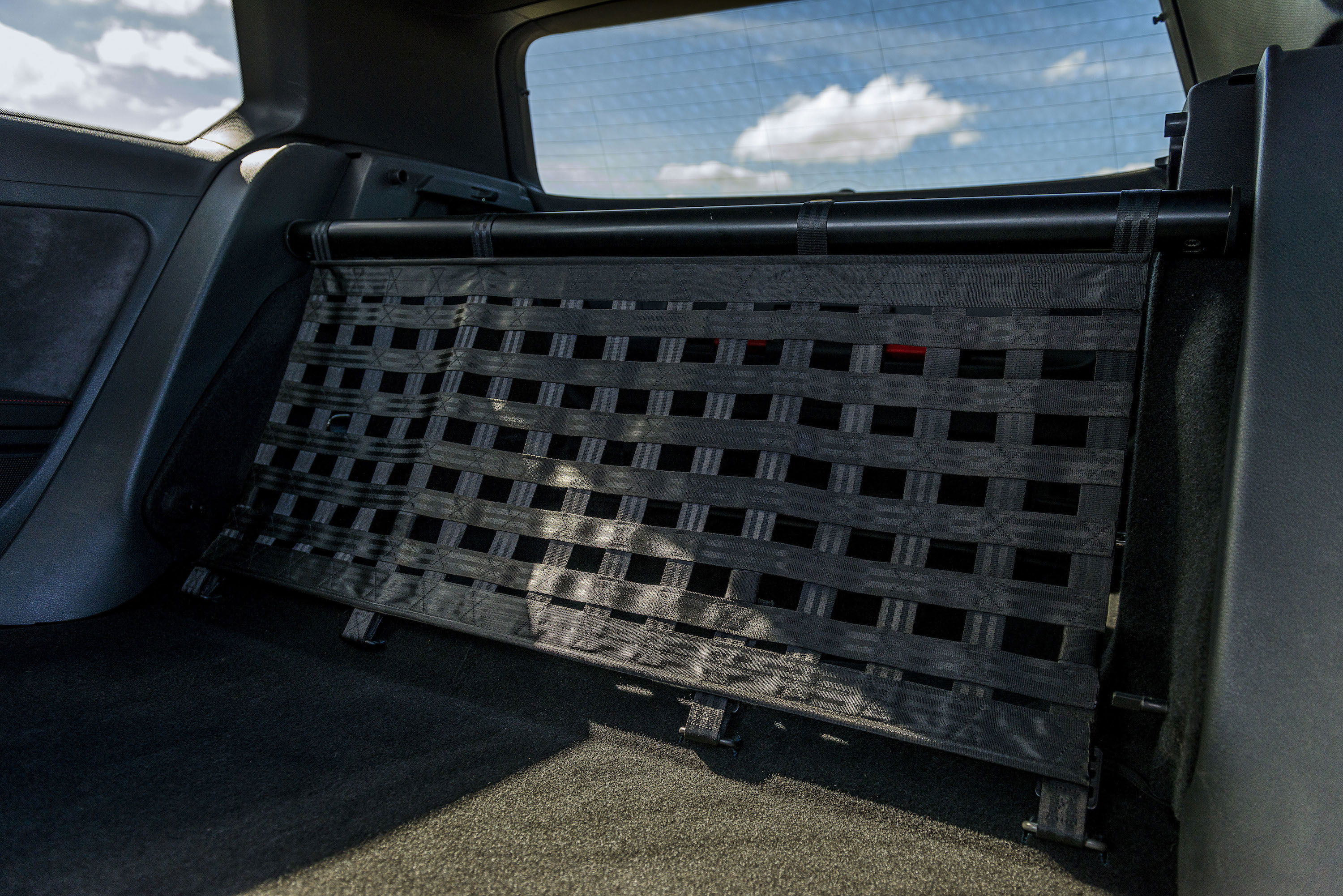 No rear seats in the Clubsport S. Instead, you get a cargo net and a metal bar - the latter a useful point to mount a harness if the mood takes you