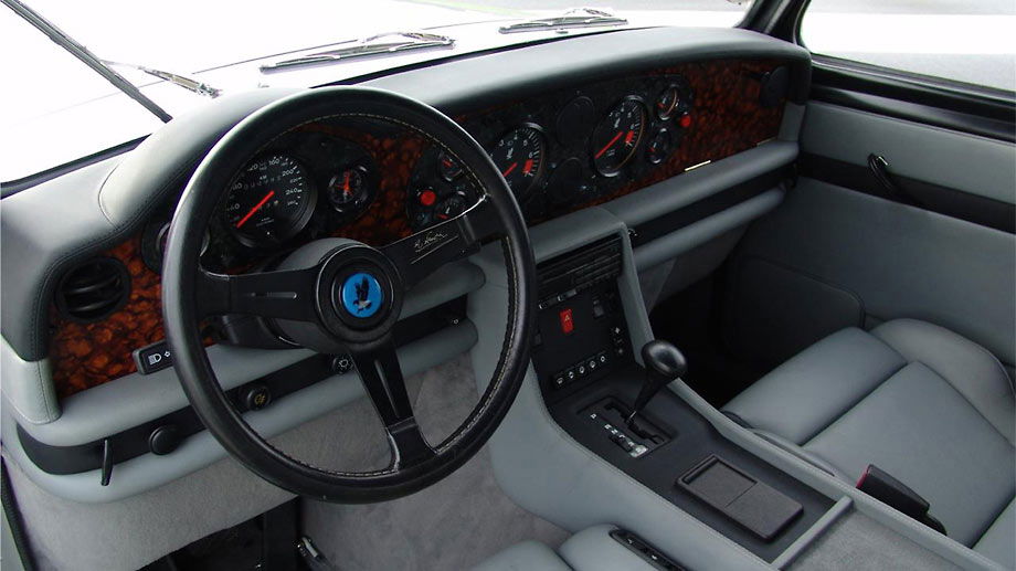 The interior, destroying the classic look at first glance. Note the three wipers