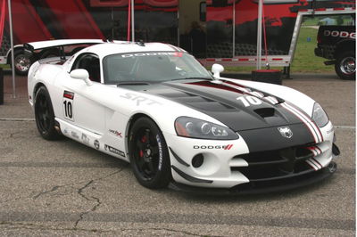 The ACR-X's paint scheme is seen above; white base, black stripe with a red and white stripe inside it