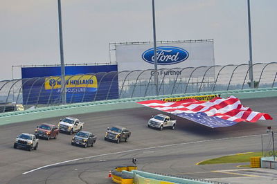 A very 'Murican photo, with the record setting F-450 in the back, lead by the upcoming Raptor in the front