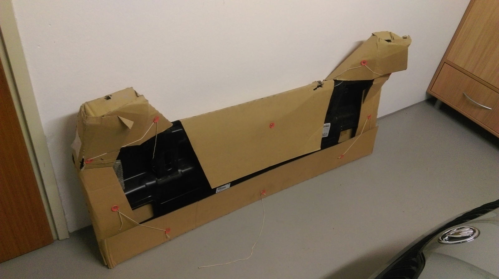 New rear pannel waiting to be welded on to the car