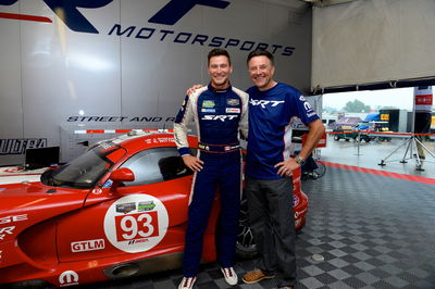 Kuno Wittmer, standing next to his Viper Racing GTLM car and his father, Patrick Wittmer